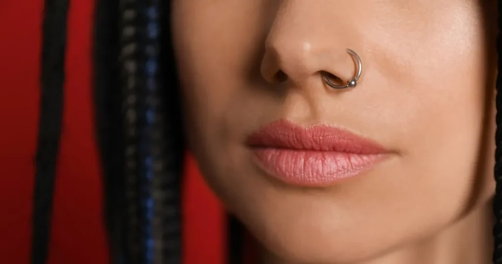 women's face with pierced nose-how to pierce your nose