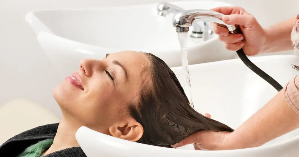 hair dresser washing a woman's hair-Water-Only Hair Washing